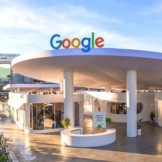 A Google sign above a futuristic store front
