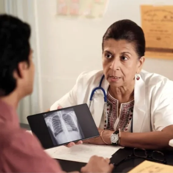 a doctor speaking with a patient
