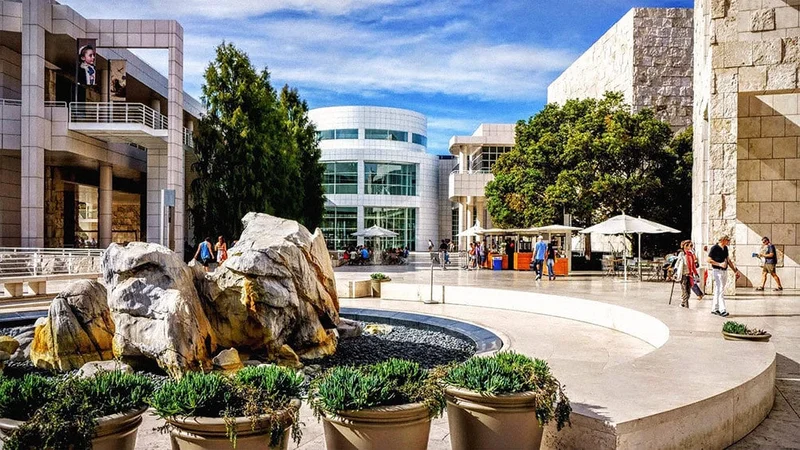 Image description: Tourists walking around The Getty Center in Los Angeles, California