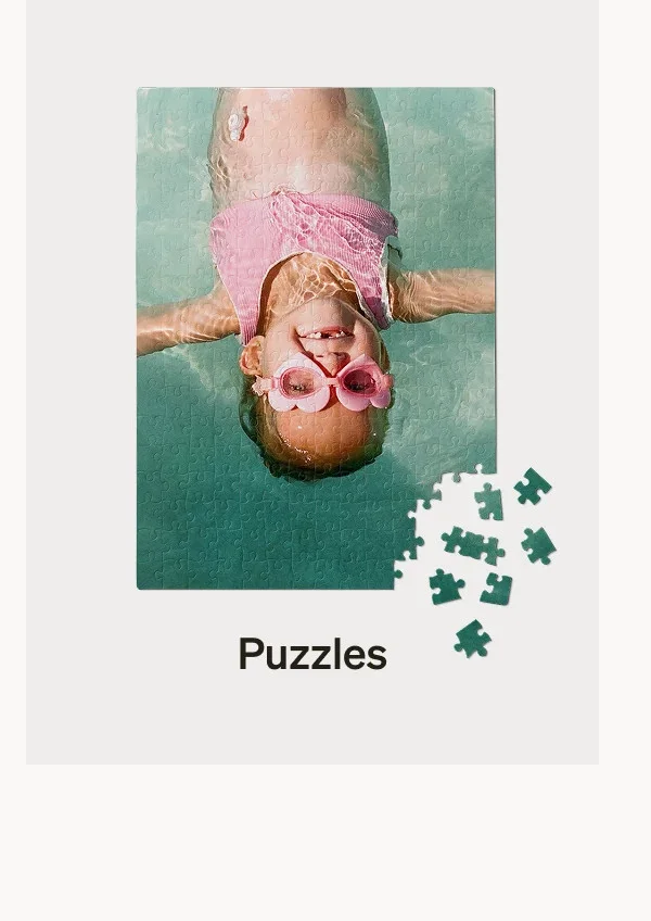Unlimited Free Photo Book Pages + Up to 50% Off Sitewide - POR