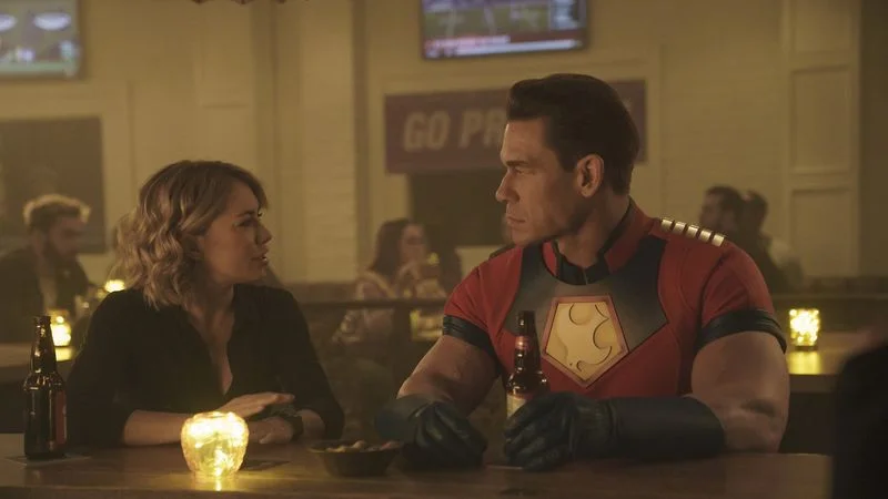 Jennifer Holland and John Cena in ‘Peacemaker’ season one