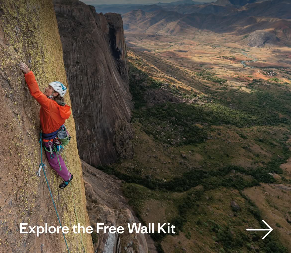 Explore the Free Wall Kit. A person climbs a big wall.