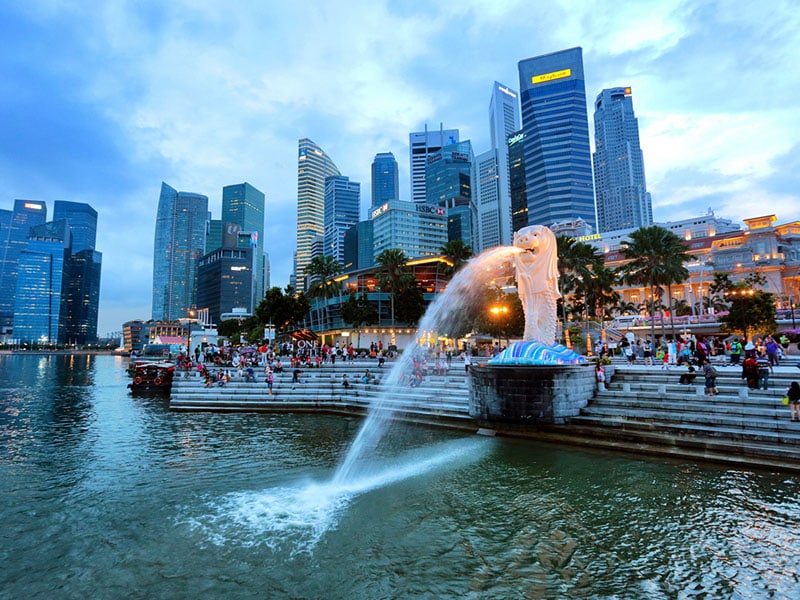 Architectural view of Singapore City at twilight.