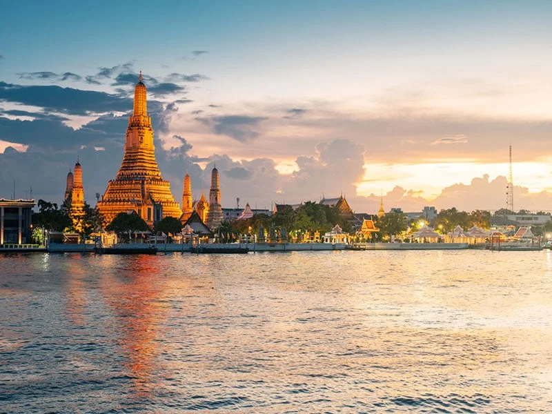 Wat Arun Ratchawararam Temple at sunset in bangkok Thailand.
