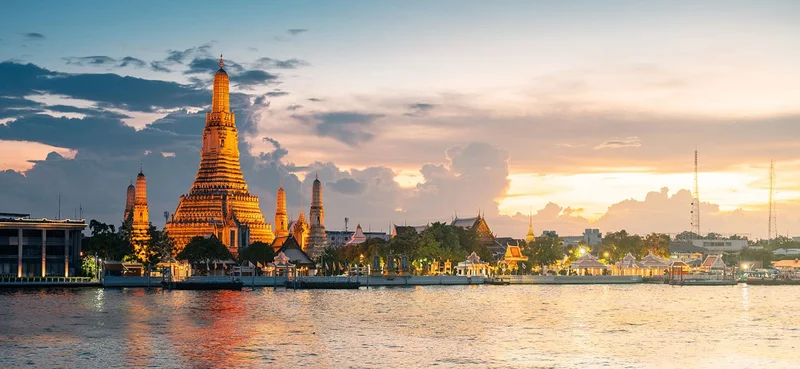 Wat Arun Ratchawararam Temple at sunset in bangkok Thailand.