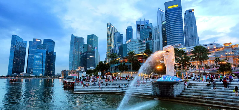 Architectural view of Singapore City at twilight.