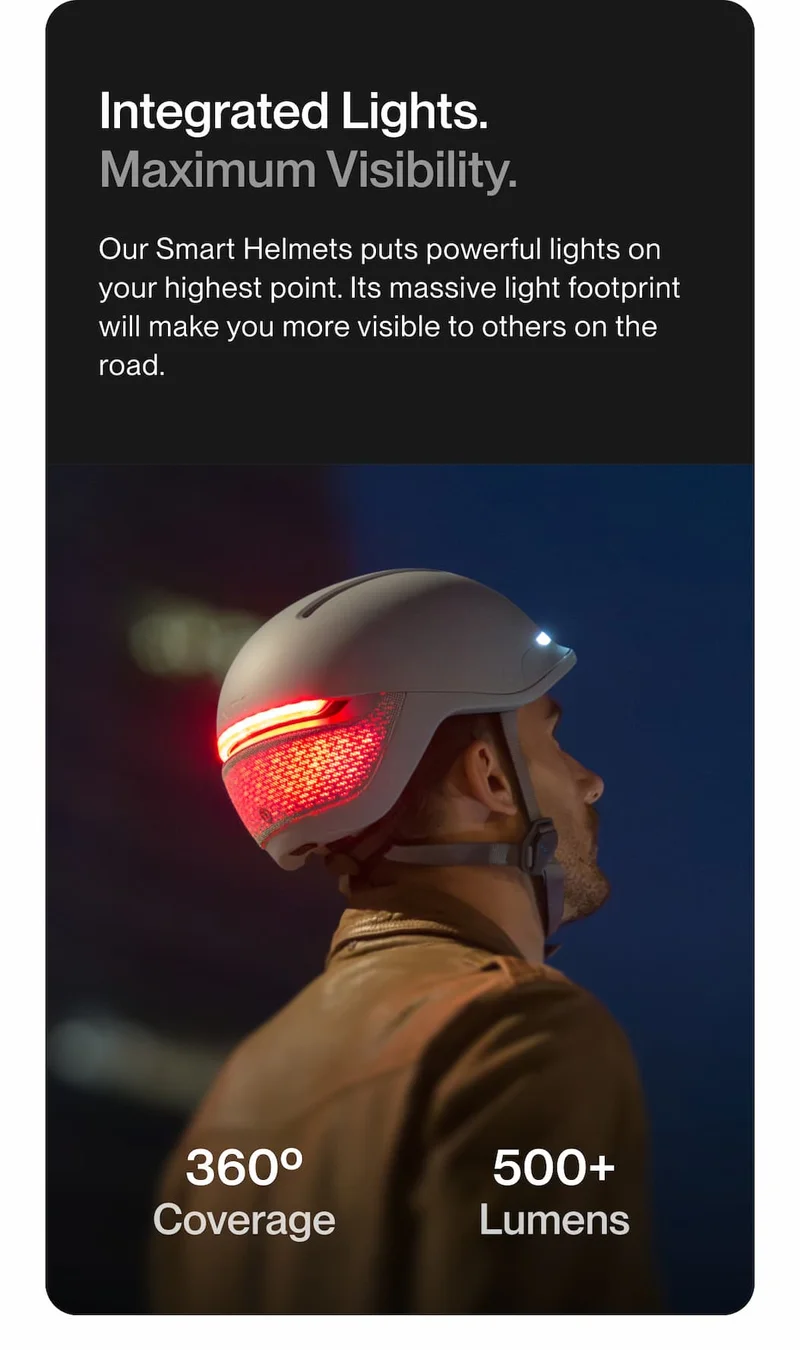 Side view of a UNIT 1 helmet glowing red. Text: Integrated Lights. Maximum Visibility.