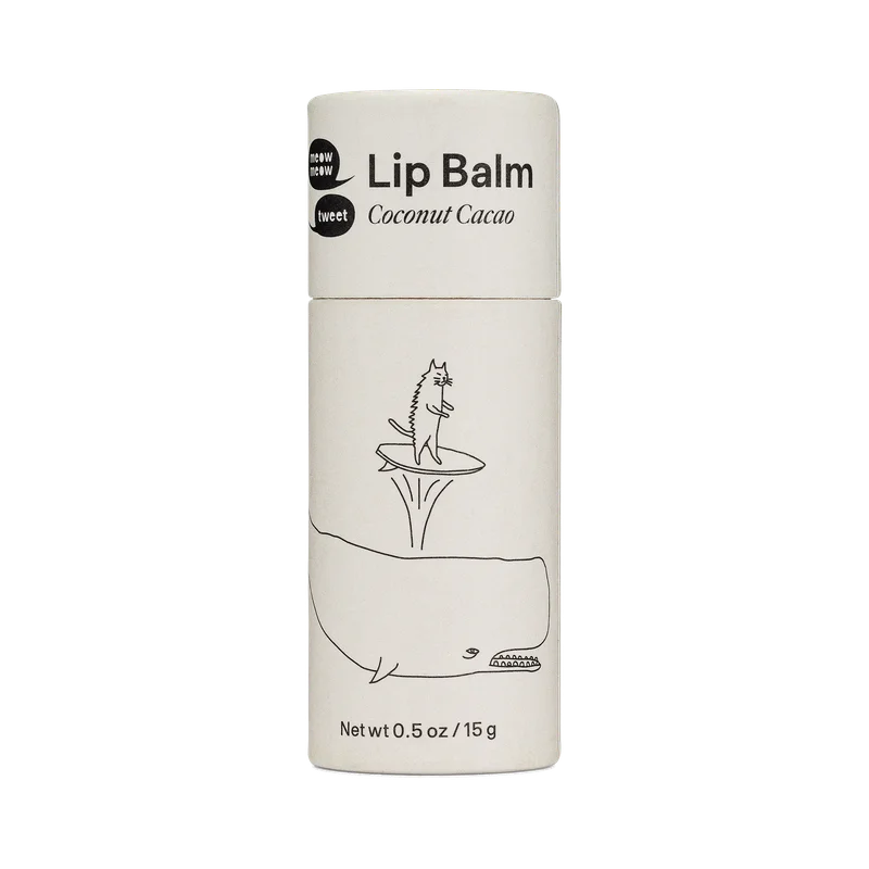 A light gray tube with black text and a cat surfing on a whale's spout drawn on it
