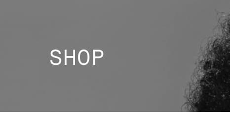 SHOP — navigation button linking to ARMRa’s online store.