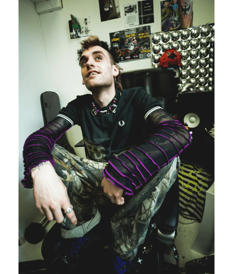 A male Fred Perry Ambassador styling Fred Perry in a punk rock way