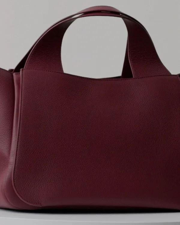 Discover the design story and expert craftsmanship behind our new Mila Satchel.