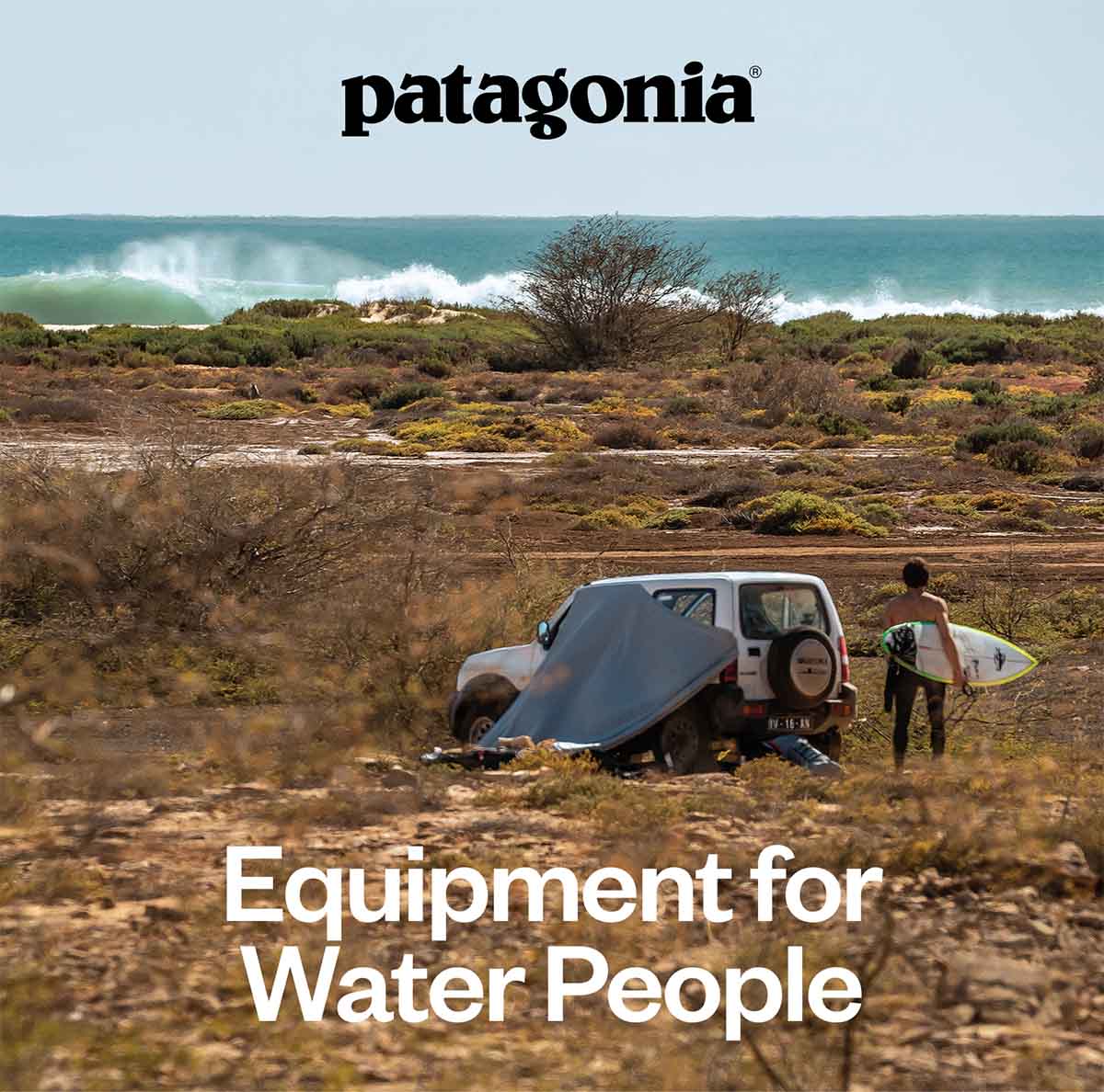 Patagonia. Equipment for Water People. A surfer walks from their campsite to a beautiful wave.