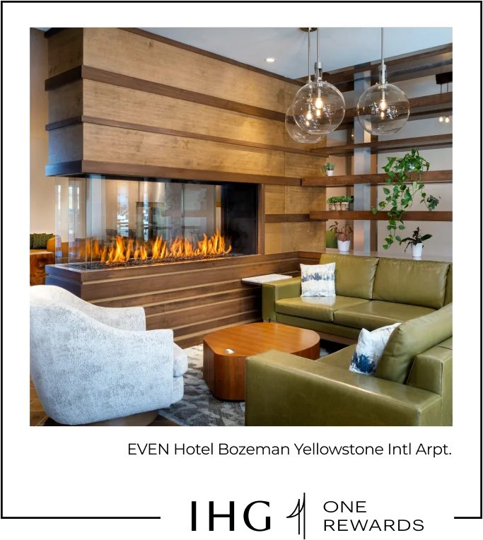 A modern three-sided peninsula glass fireplace is an innovative lobby centerpiece.