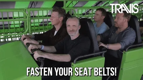 Group of people on a rollercoaster with the caption, "Fasten your seat belts!"