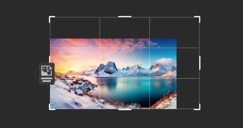 An image of a sunrise over snowy mountains.