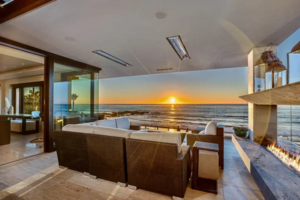 Enjoy open-air breezes and epic vistas in a vacation home near the beach.