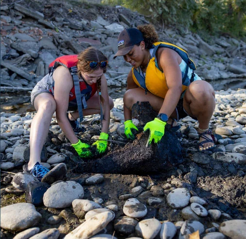 Take local action. Volunteers team up at the Yellowstone River Cleanup.
