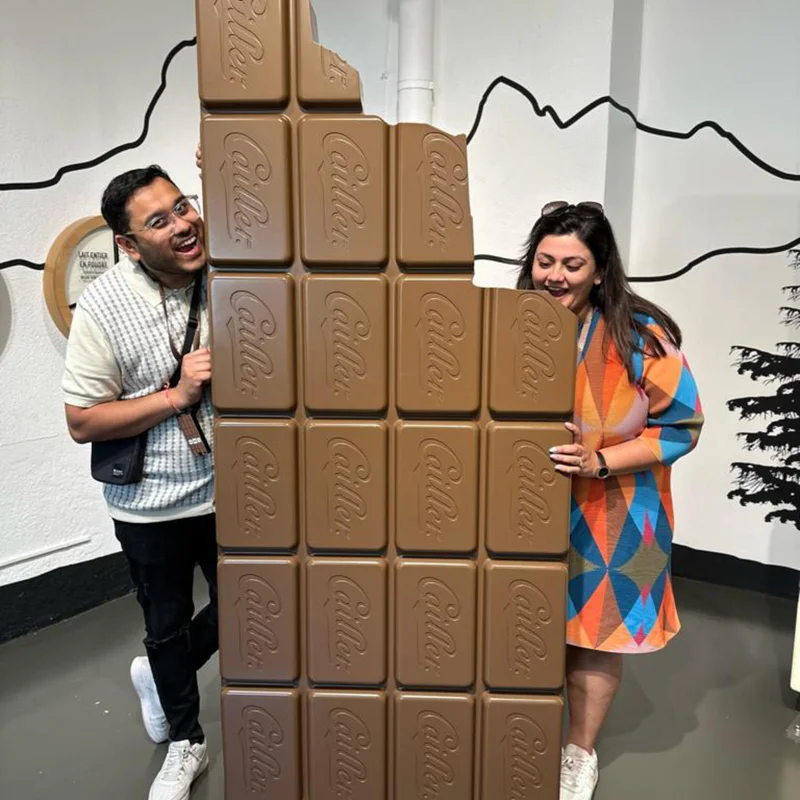 Elsewhere travelers touring a chocolate factory.
