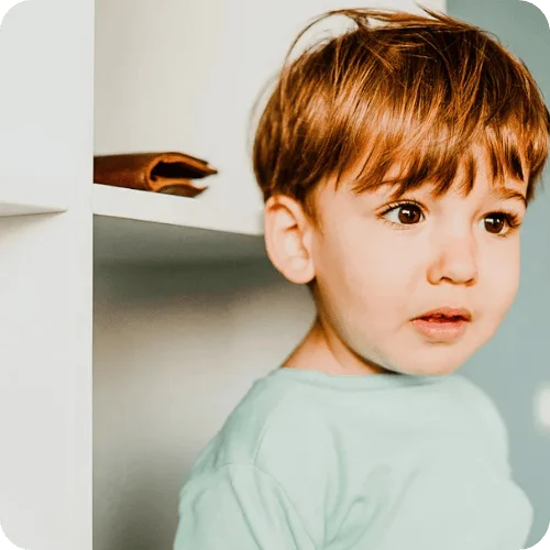 a toddler looking like he doesn't like what he sees a toddler looking like he doesn't like what he sees