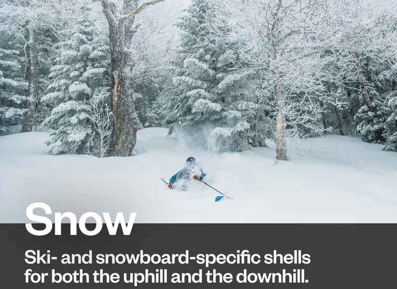 A person on skis making a turn in deep powder.