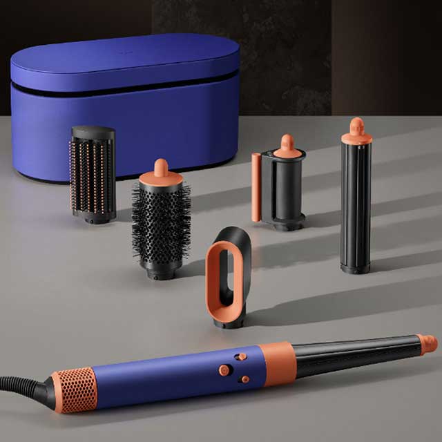 Presentation case with the Dyson Airwrap i.d. multi-styler and dryer with attachments.