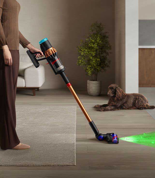 A person using the All Floor Cones sense cleaner head with illumination.