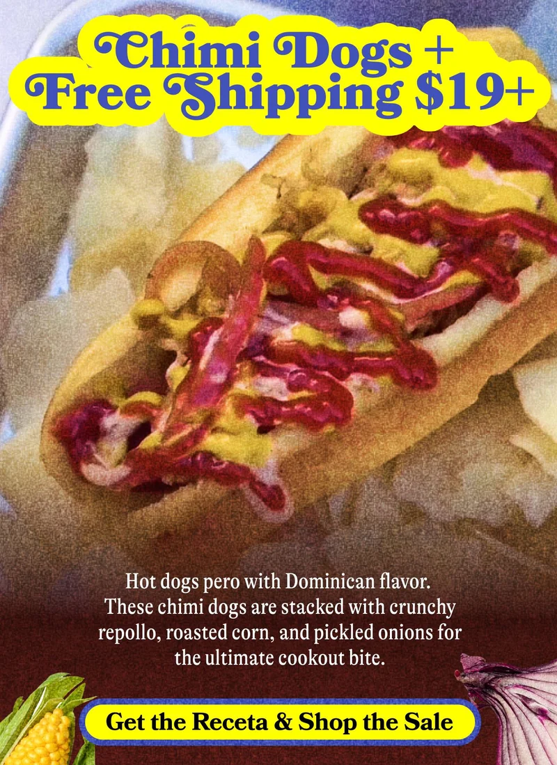 Chimi Dogs for Labor Day  Hot dogs pero with Dominican flavor. These chimi dogs are stacked with crunchy repollo, roasted corn, and pickled onions for the ultimate cookout bite. GET THE RECETA