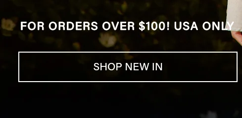 White text "FOR ORDERS OVER $100! USA ONLY" on a dark foliage background with hints of white flowers. "SHOP NEW IN" button encourages exploring the new collection arrivals.