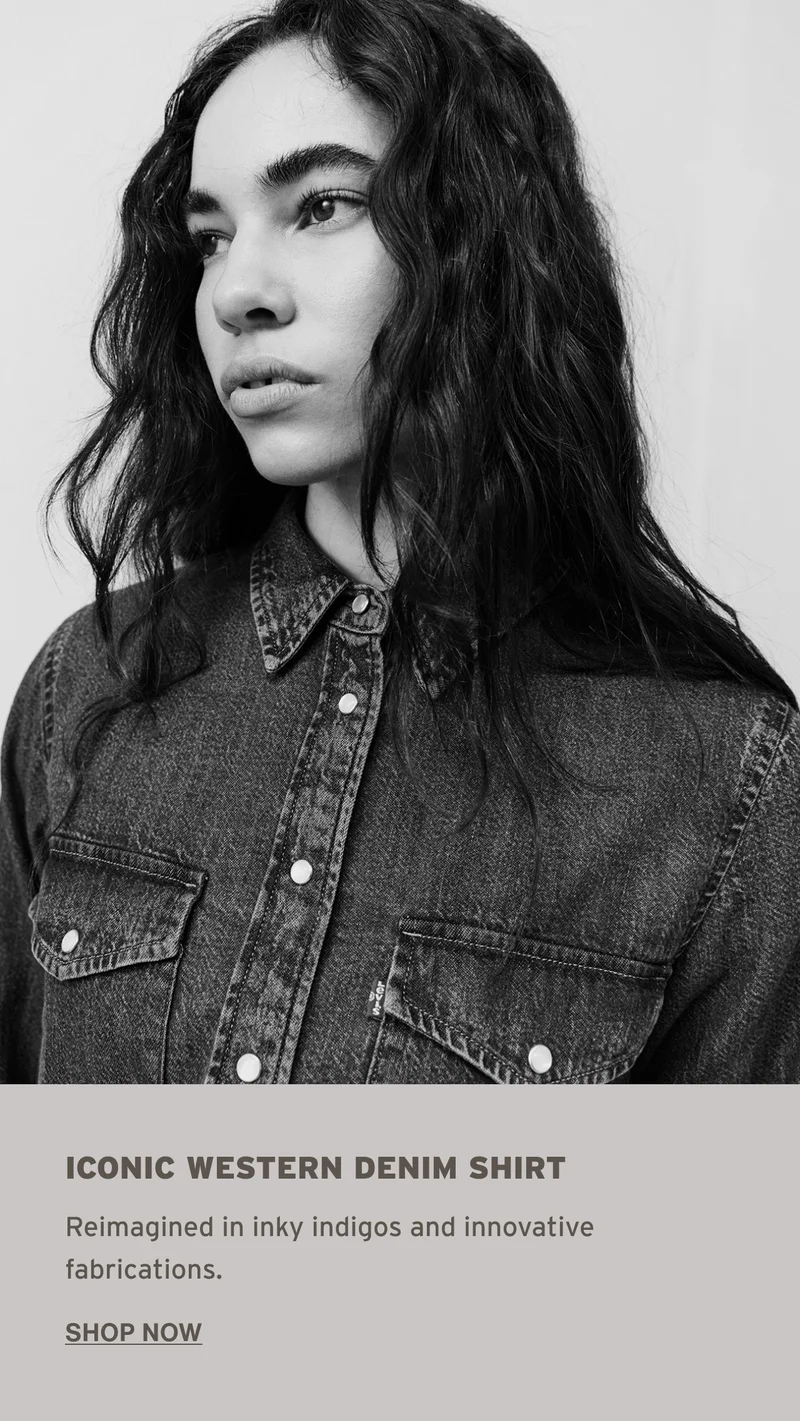 Black and white image of a person wearing a western shirt
