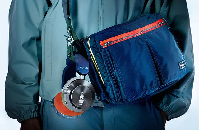 A close up of the PORTER shoulder bag showing the headphone holder
