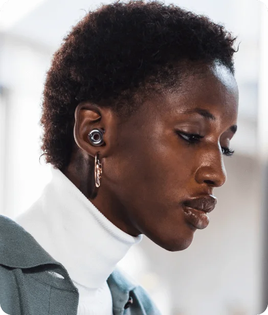 A woman wearing a pair of Loop Switch 2