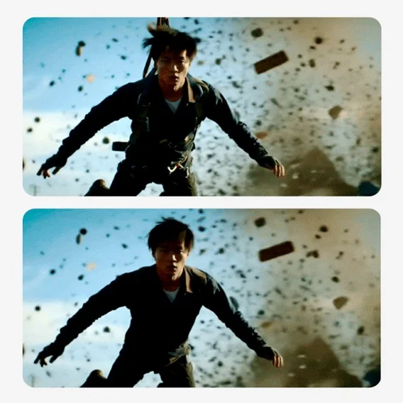 Two nearly identical images show a person with dark hair and a dark jacket falling downwards against a backdrop of smoke, debris, and sky.