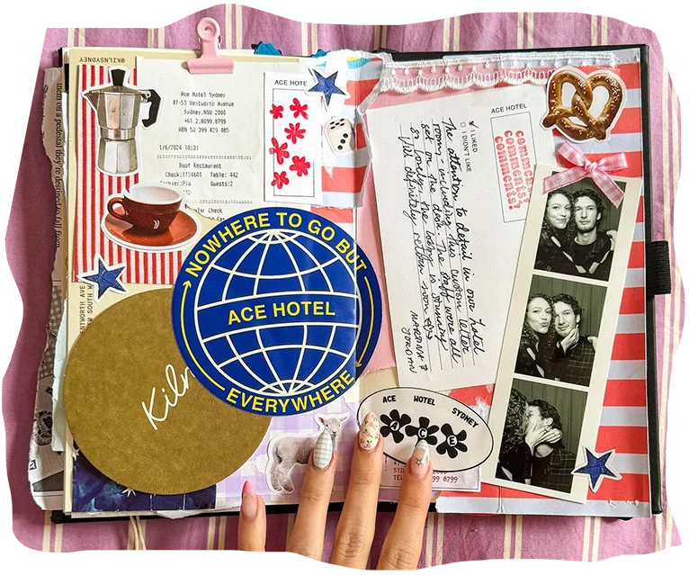 A detailed scrapbook spread featuring various mementos, photographs, and handwritten notes, with a person’s hand holding the page open.