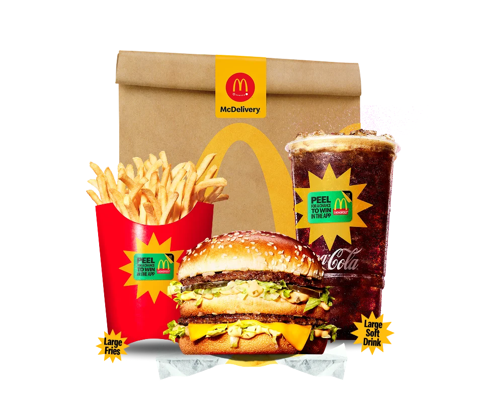 A meal in front of a McDelivery bag.