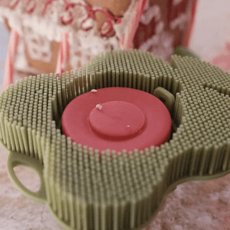Moving image of crushed peppermint cascading ontop of a peppermint smoosh body bar