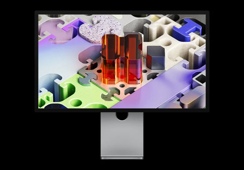 Front of Studio Display XDR with a three-dimensional puzzle-like wallpaper