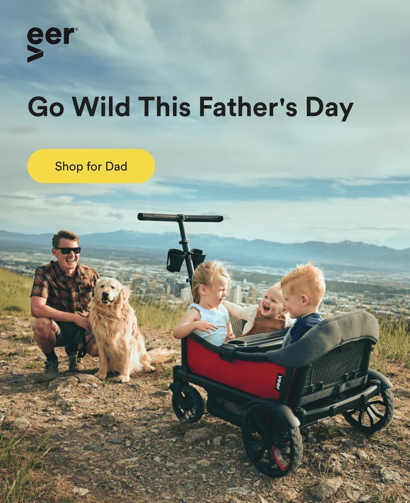 3 children in Cruiser XL with Dad on dirt path