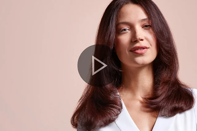 Brunette model with 90s-inspired hair