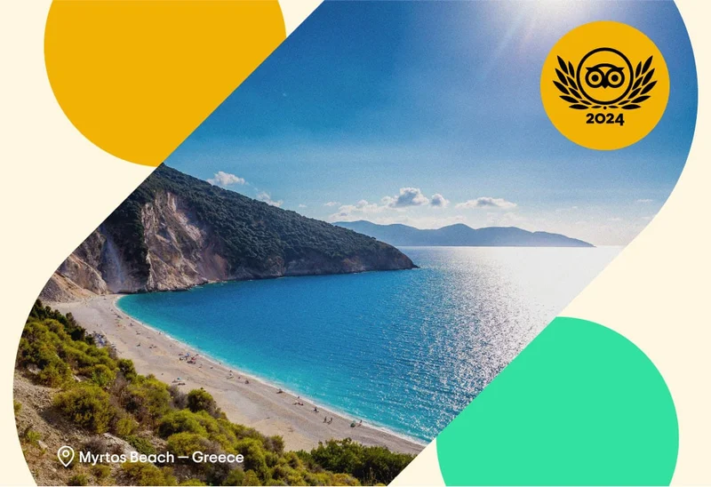 Image Description: Green cliffs rolling into a sparkling blue ocean at Myrtos Beach, Greece. A gold 2024 Travelers’ Choice Awards Best of the Best badge is on the top right corner.