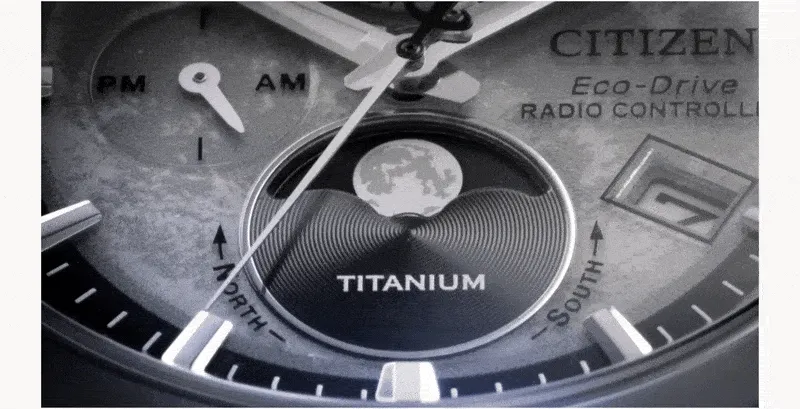 Embodying the moon’s surface with a window at 6 o’clock to display the moon’s current phase.