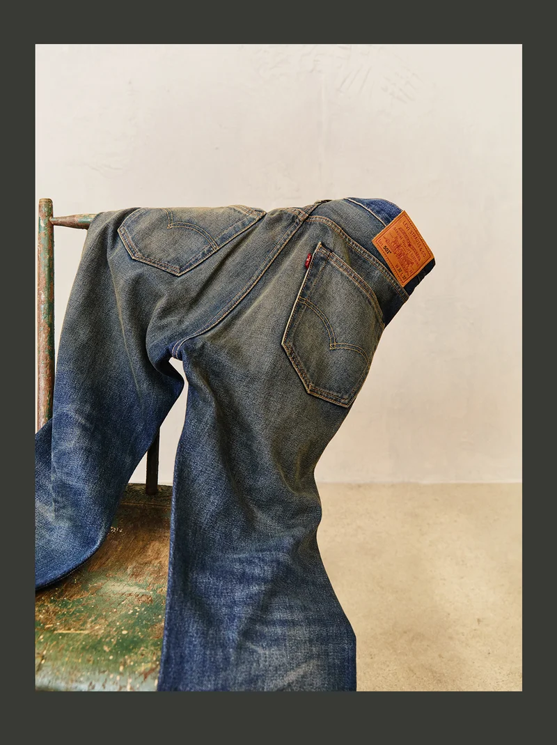 Jeans draped over a chair