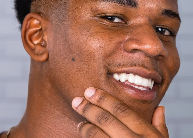 Man showing clean-shaven face