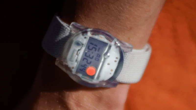 Image may contain: Wristwatch, Arm, Body Part, Person, Baby, Digital Watch, Electronics, and Hand