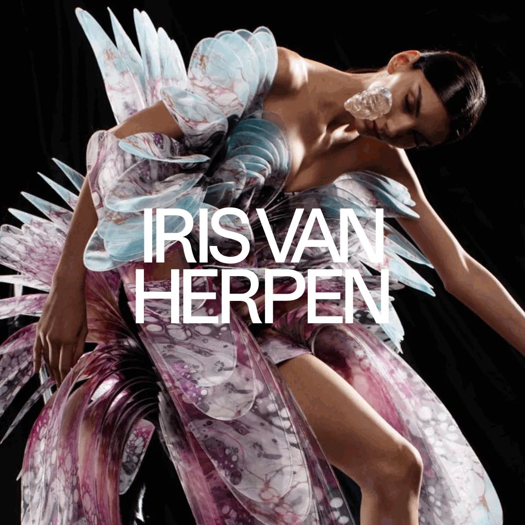A GIF of models wearing gowns evoking feathers and skeletons