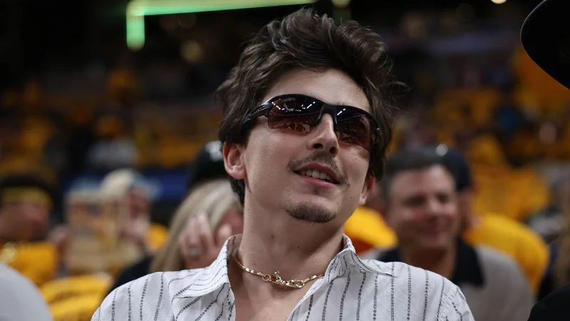 Image may contain: Timothée Chalamet, Chuck Howley, Accessories, Sunglasses, Glasses, Head, Person, Face, and Adult