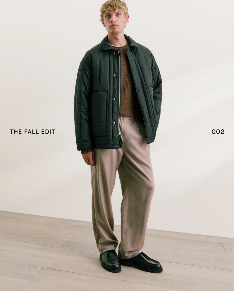 Image | The Fall Edit 002 | Model in ReNew Vertical-Quilted Jacket, Waffle Rollneck Crew in Everyday Cotton, Relaxed Classic Tee and Pleated Trouser in Tailor Twill.