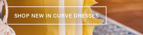 Woman in a vibrant yellow and white striped curve dress. White text box: 'SHOP NEW IN CURVE DRESSES'. Shop the latest collection now.