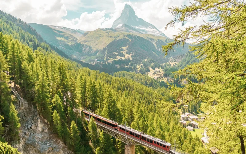 The Gornergrat train ascends 4,900 feet from Zermatt to the Gornergrat summit in Switzerland.