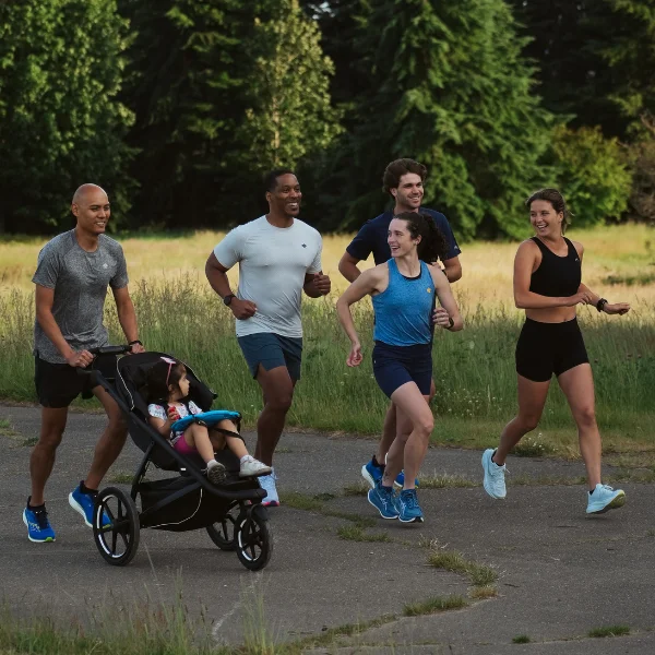 Group of people running together