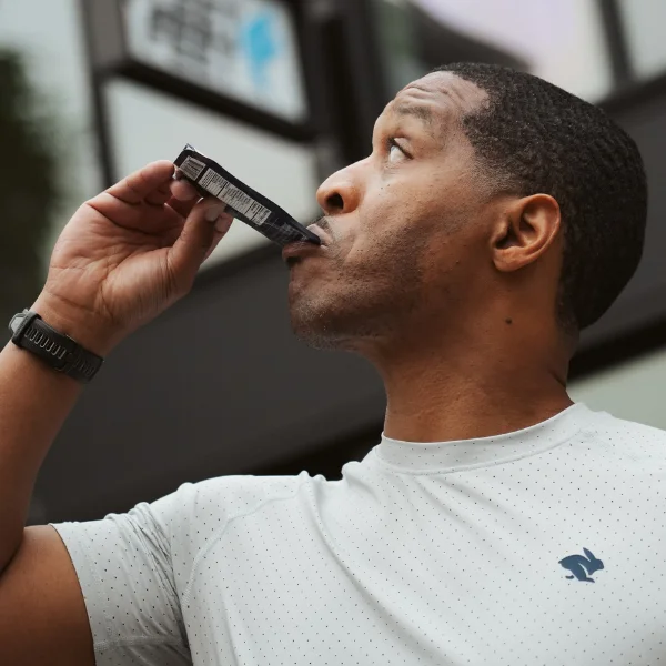 Man eating an energy gel